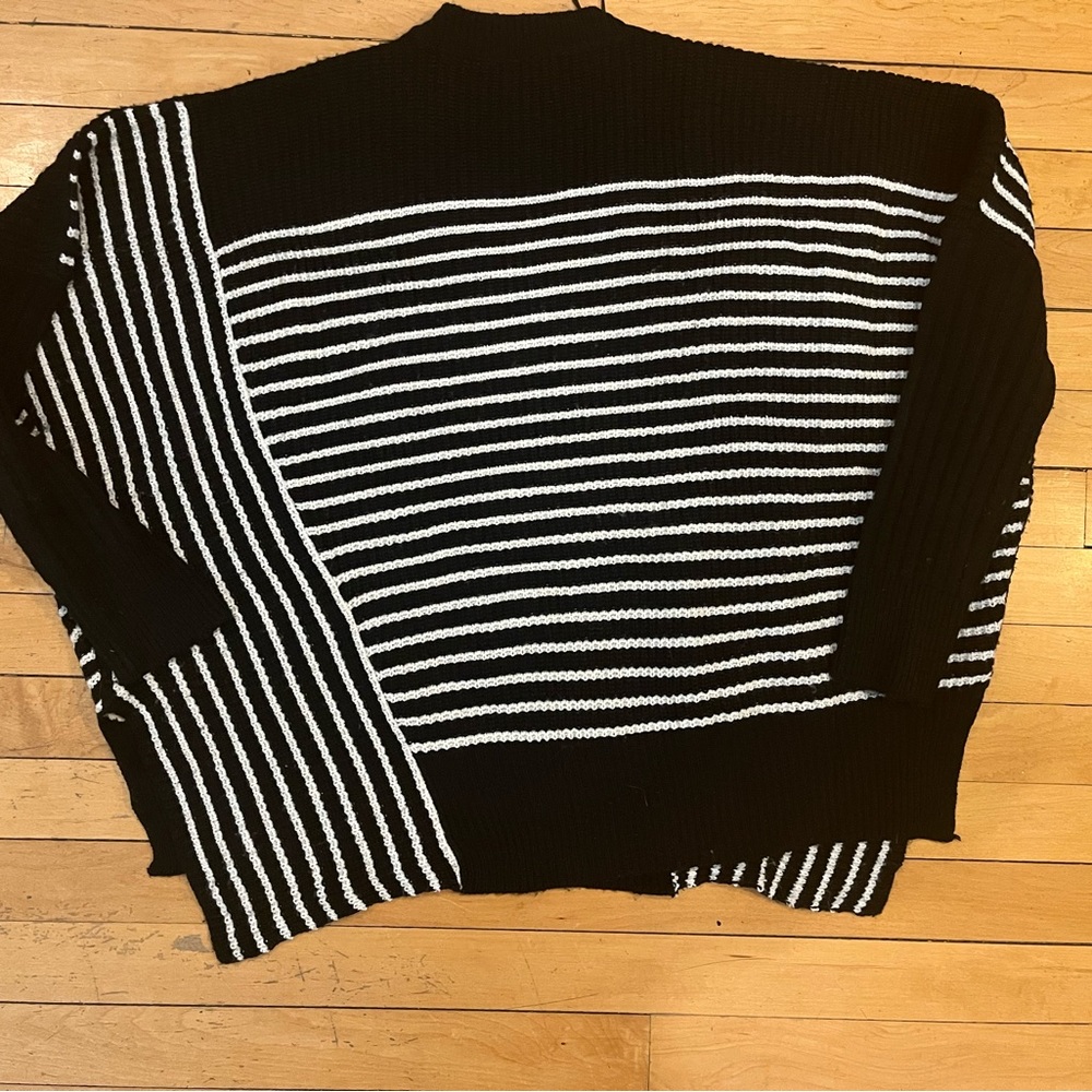Romeo & Juliet couture asymmetrical black and white boxy sweater. Size small